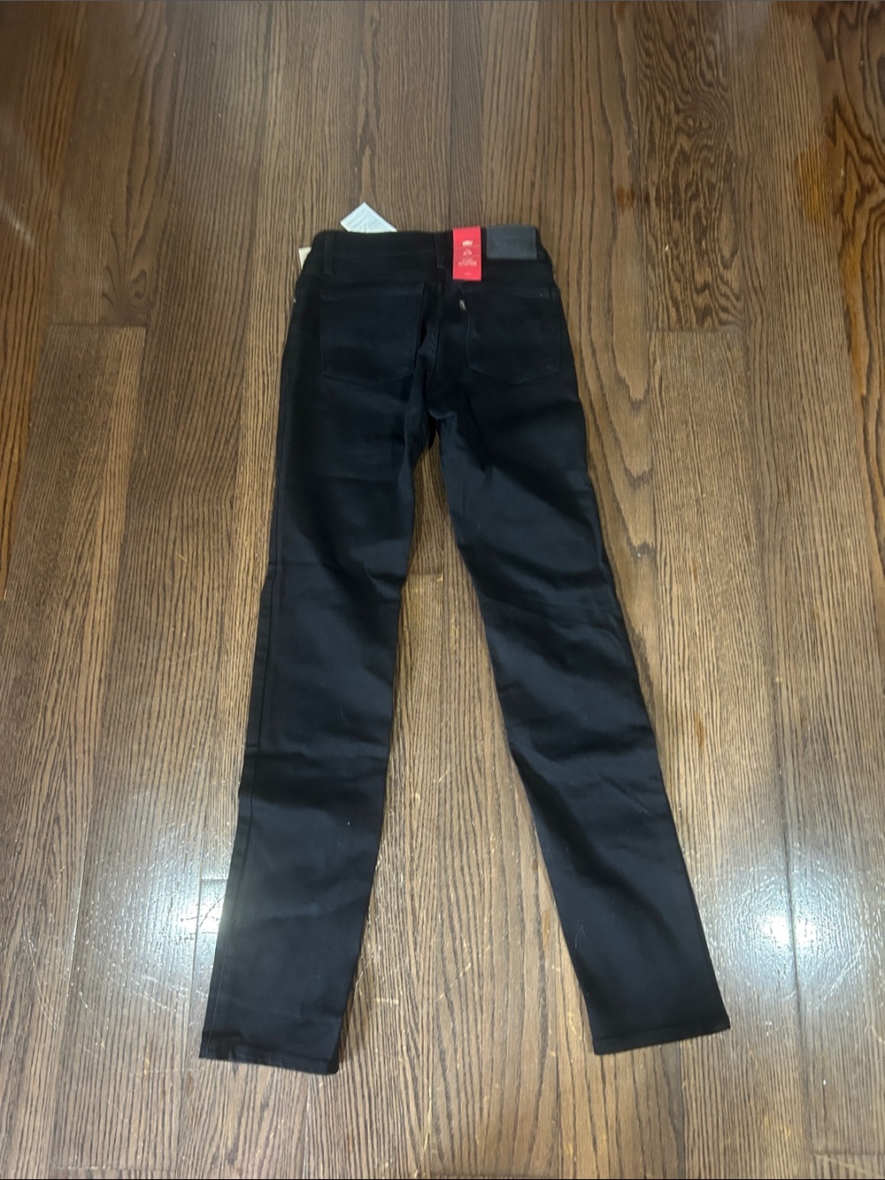 NWT Levi’s black 712 slim jeans 24x32